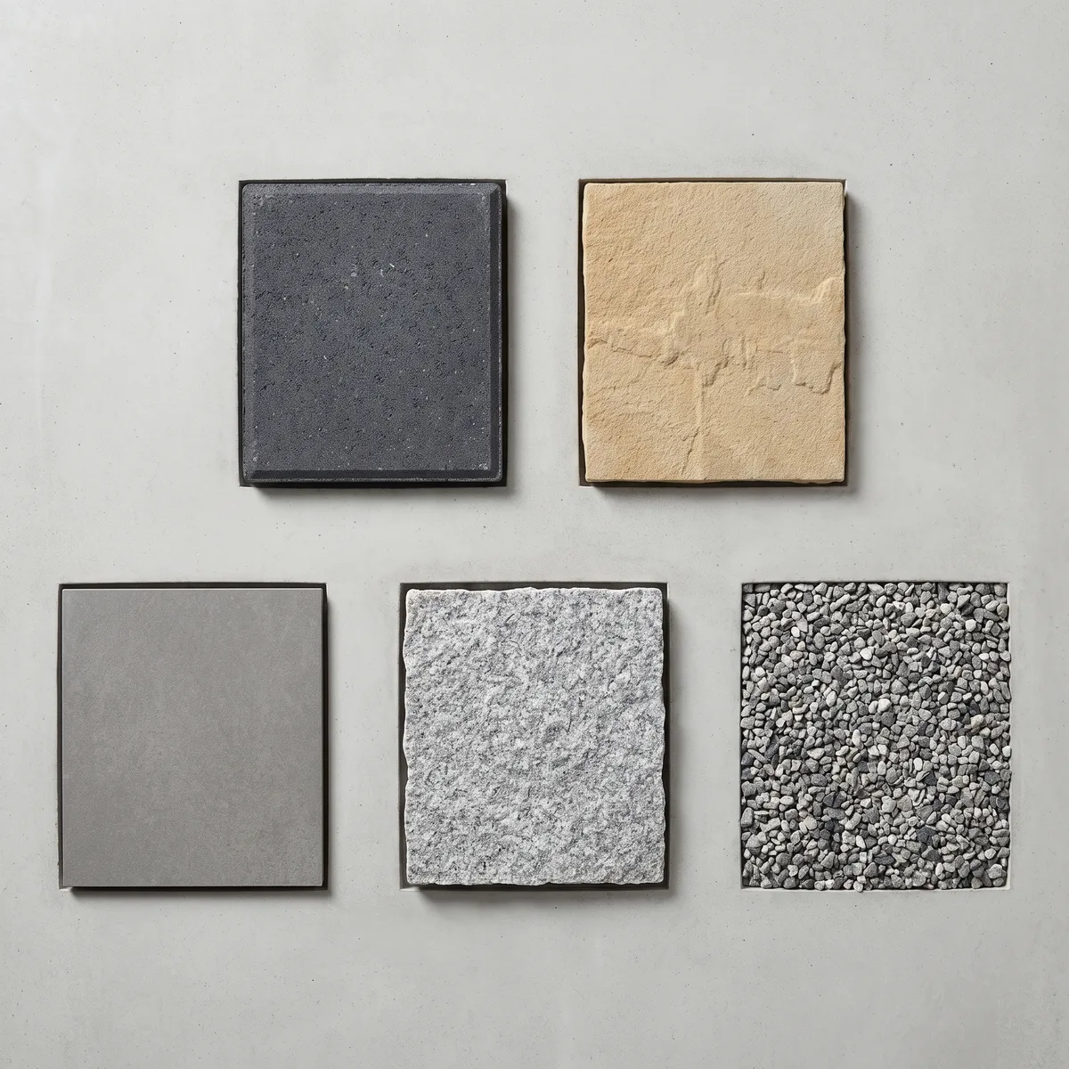 Paving blocks, stone and aggregate samples on a material board